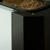 Wood pellet are loaded into the Klover Ecompact through this door to the internal hopper