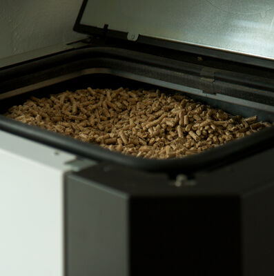 Wood pellet are loaded into the Klover Ecompact through this door to the internal hopper