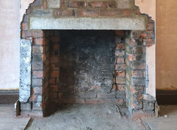 Fireplace before installation of a Parkray Aspect 5 stove